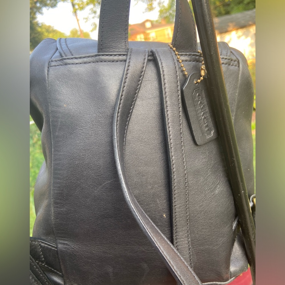 leather Coach backpack 11” x 11”.  VIEW PICS CLOSELY, SCRATCHES ON FRONT FLAP - Picture 2 of 9